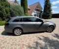 Серый Опель Инсигния, объемом двигателя 2 л и пробегом 246 тыс. км за 11700 $, фото 4 на Automoto.ua