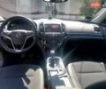Сірий Опель Інсігнія, об'ємом двигуна 1.6 л та пробігом 248 тис. км за 10999 $, фото 17 на Automoto.ua