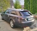 Серый Опель Инсигния, объемом двигателя 2 л и пробегом 193 тыс. км за 10450 $, фото 5 на Automoto.ua