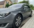 Серый Опель Инсигния, объемом двигателя 1.6 л и пробегом 216 тыс. км за 13700 $, фото 2 на Automoto.ua