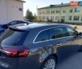 Серый Опель Инсигния, объемом двигателя 1.6 л и пробегом 248 тыс. км за 10999 $, фото 4 на Automoto.ua