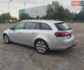 Серый Опель Инсигния, объемом двигателя 1.6 л и пробегом 254 тыс. км за 7999 $, фото 2 на Automoto.ua