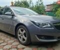 Сірий Опель Інсігнія, об'ємом двигуна 1.6 л та пробігом 216 тис. км за 10500 $, фото 2 на Automoto.ua