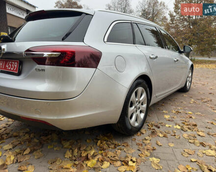 Серый Опель Инсигния, объемом двигателя 1.96 л и пробегом 213 тыс. км за 9900 $, фото 4 на Automoto.ua