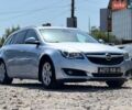 Серый Опель Инсигния, объемом двигателя 1.96 л и пробегом 185 тыс. км за 12000 $, фото 4 на Automoto.ua