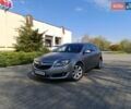 Сірий Опель Інсігнія, об'ємом двигуна 1.96 л та пробігом 298 тис. км за 8999 $, фото 1 на Automoto.ua