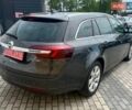 Серый Опель Инсигния, объемом двигателя 2 л и пробегом 218 тыс. км за 10500 $, фото 7 на Automoto.ua