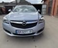 Серый Опель Инсигния, объемом двигателя 2 л и пробегом 186 тыс. км за 11809 $, фото 1 на Automoto.ua