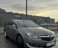 Сірий Опель Інсігнія, об'ємом двигуна 1.6 л та пробігом 258 тис. км за 10899 $, фото 2 на Automoto.ua