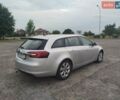 Серый Опель Инсигния, объемом двигателя 1.6 л и пробегом 254 тыс. км за 7999 $, фото 1 на Automoto.ua