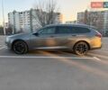 Серый Опель Инсигния, объемом двигателя 2 л и пробегом 245 тыс. км за 15099 $, фото 6 на Automoto.ua