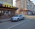 Сірий Опель Інсігнія, об'ємом двигуна 1.6 л та пробігом 215 тис. км за 11400 $, фото 1 на Automoto.ua
