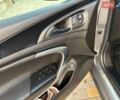 Сірий Опель Інсігнія, об'ємом двигуна 1.96 л та пробігом 226 тис. км за 13499 $, фото 7 на Automoto.ua