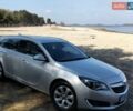 Сірий Опель Інсігнія, об'ємом двигуна 1.96 л та пробігом 176 тис. км за 11300 $, фото 4 на Automoto.ua