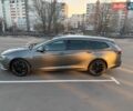 Серый Опель Инсигния, объемом двигателя 2 л и пробегом 245 тыс. км за 15099 $, фото 20 на Automoto.ua