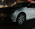 Серый Опель Инсигния, объемом двигателя 2 л и пробегом 225 тыс. км за 14990 $, фото 7 на Automoto.ua