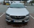 Серый Опель Инсигния, объемом двигателя 2 л и пробегом 224 тыс. км за 14990 $, фото 1 на Automoto.ua