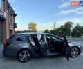 Серый Опель Инсигния, объемом двигателя 2 л и пробегом 190 тыс. км за 13400 $, фото 3 на Automoto.ua
