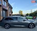 Серый Опель Инсигния, объемом двигателя 2 л и пробегом 190 тыс. км за 13400 $, фото 2 на Automoto.ua