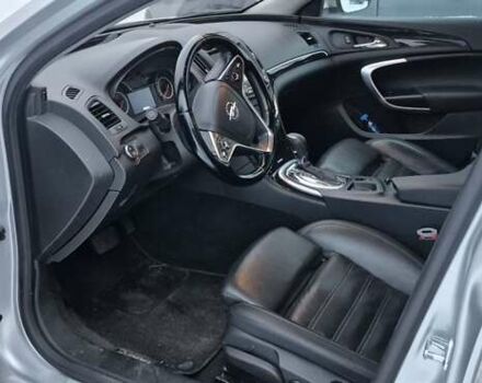 Серый Опель Инсигния, объемом двигателя 2 л и пробегом 120 тыс. км за 10300 $, фото 1 на Automoto.ua