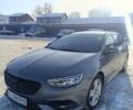 Серый Опель Инсигния, объемом двигателя 1.6 л и пробегом 255 тыс. км за 13400 $, фото 1 на Automoto.ua