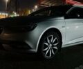Серый Опель Инсигния, объемом двигателя 2 л и пробегом 225 тыс. км за 14990 $, фото 7 на Automoto.ua