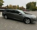 Серый Опель Инсигния, объемом двигателя 2 л и пробегом 209 тыс. км за 13800 $, фото 12 на Automoto.ua