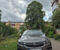 Серый Опель Инсигния, объемом двигателя 1.6 л и пробегом 256 тыс. км за 10000 $, фото 2 на Automoto.ua