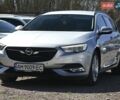 Серый Опель Инсигния, объемом двигателя 1.96 л и пробегом 114 тыс. км за 15999 $, фото 5 на Automoto.ua