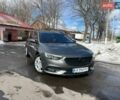 Сірий Опель Інсігнія, об'ємом двигуна 1.6 л та пробігом 255 тис. км за 13700 $, фото 1 на Automoto.ua