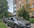 Серый Опель Инсигния, объемом двигателя 1.6 л и пробегом 256 тыс. км за 10000 $, фото 1 на Automoto.ua