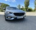 Сірий Опель Інсігнія, об'ємом двигуна 2 л та пробігом 237 тис. км за 14899 $, фото 1 на Automoto.ua