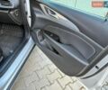 Сірий Опель Інсігнія, об'ємом двигуна 1.96 л та пробігом 235 тис. км за 14890 $, фото 25 на Automoto.ua