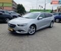 Сірий Опель Інсігнія, об'ємом двигуна 1.96 л та пробігом 203 тис. км за 14800 $, фото 1 на Automoto.ua