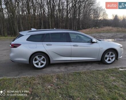 Сірий Опель Інсігнія, об'ємом двигуна 1.6 л та пробігом 230 тис. км за 15499 $, фото 7 на Automoto.ua