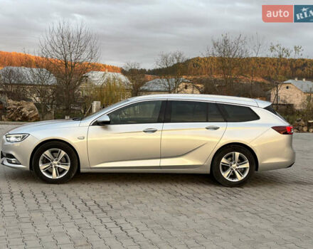 Серый Опель Инсигния, объемом двигателя 1.96 л и пробегом 210 тыс. км за 15250 $, фото 3 на Automoto.ua