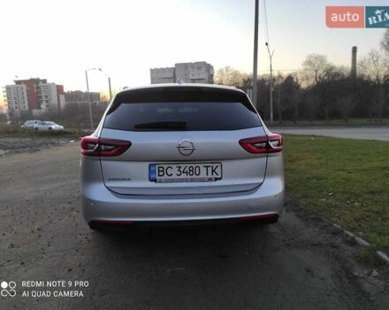 Сірий Опель Інсігнія, об'ємом двигуна 1.6 л та пробігом 230 тис. км за 15499 $, фото 4 на Automoto.ua