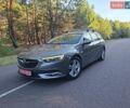 Серый Опель Инсигния, объемом двигателя 2 л и пробегом 169 тыс. км за 13400 $, фото 1 на Automoto.ua