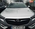 Серый Опель Инсигния, объемом двигателя 2 л и пробегом 239 тыс. км за 15200 $, фото 1 на Automoto.ua