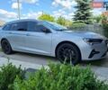 Серый Опель Инсигния, объемом двигателя 2 л и пробегом 108 тыс. км за 21000 $, фото 3 на Automoto.ua