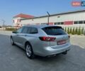 Серый Опель Инсигния, объемом двигателя 2 л и пробегом 179 тыс. км за 18700 $, фото 7 на Automoto.ua