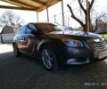 Серый Опель Инсигния, объемом двигателя 2 л и пробегом 215 тыс. км за 9400 $, фото 1 на Automoto.ua