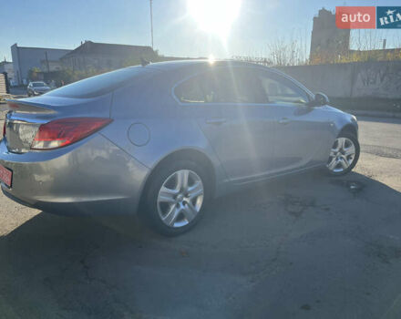 Серый Опель Инсигния, объемом двигателя 1.8 л и пробегом 188 тыс. км за 7200 $, фото 2 на Automoto.ua