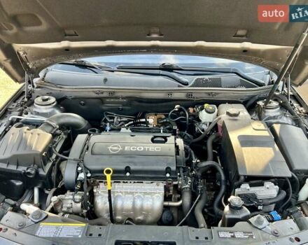 Серый Опель Инсигния, объемом двигателя 1.8 л и пробегом 208 тыс. км за 7400 $, фото 16 на Automoto.ua