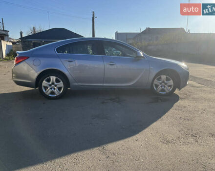 Серый Опель Инсигния, объемом двигателя 1.8 л и пробегом 188 тыс. км за 7200 $, фото 1 на Automoto.ua