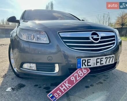 Серый Опель Инсигния, объемом двигателя 1.8 л и пробегом 208 тыс. км за 7400 $, фото 6 на Automoto.ua