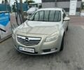 Серый Опель Инсигния, объемом двигателя 2 л и пробегом 403 тыс. км за 4300 $, фото 1 на Automoto.ua