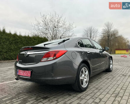 Серый Опель Инсигния, объемом двигателя 1.8 л и пробегом 234 тыс. км за 7500 $, фото 5 на Automoto.ua