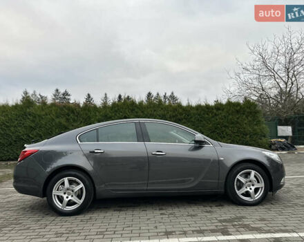 Серый Опель Инсигния, объемом двигателя 1.8 л и пробегом 234 тыс. км за 7500 $, фото 4 на Automoto.ua