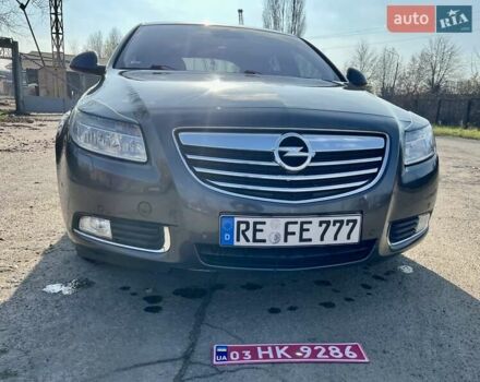 Серый Опель Инсигния, объемом двигателя 1.8 л и пробегом 208 тыс. км за 7400 $, фото 4 на Automoto.ua